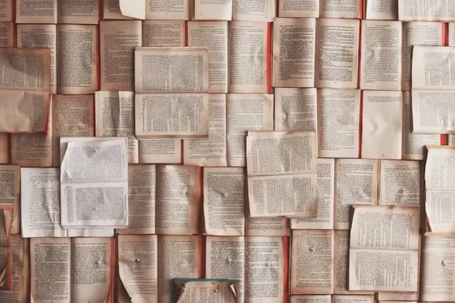 A table full of book pages