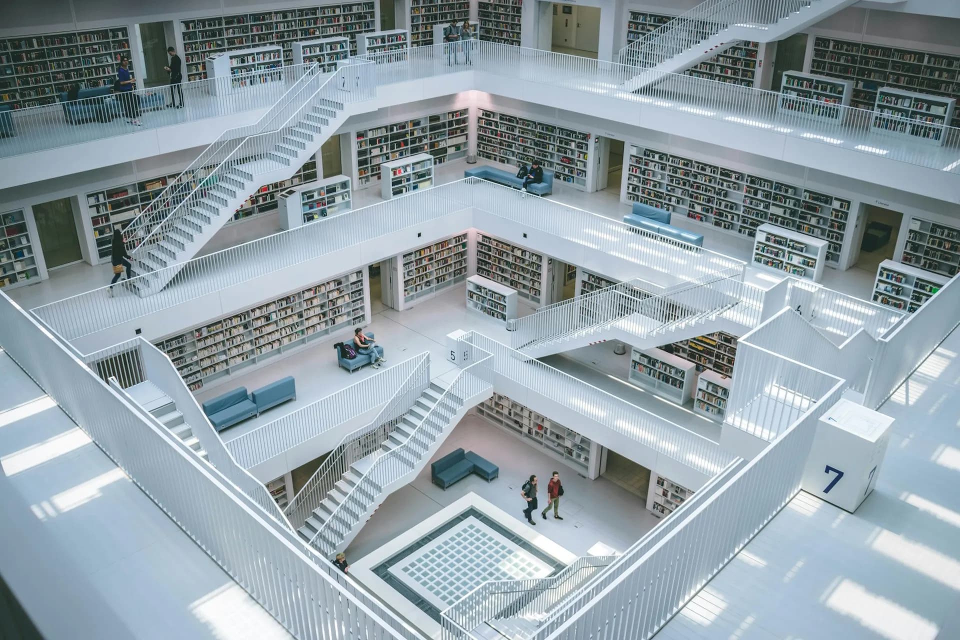 People working inside a library